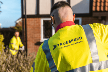 Two Truespeed engineers Installing full-fibre broadband at a customers home