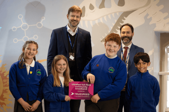 Truespeed have connected over 150 community hubs and schools for free. Here we are presenting a school with their connection certificate