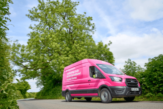 Truespeed van driving through a rural area