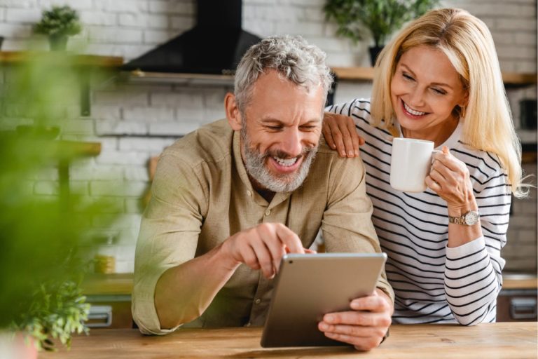 A couple using Truespeed's ultrafast broadband at home