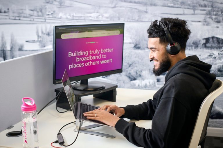 A Truespeed customer service representative in the office in Bath